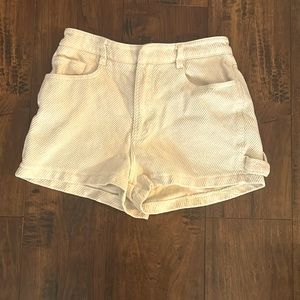 Cream colored small shorts